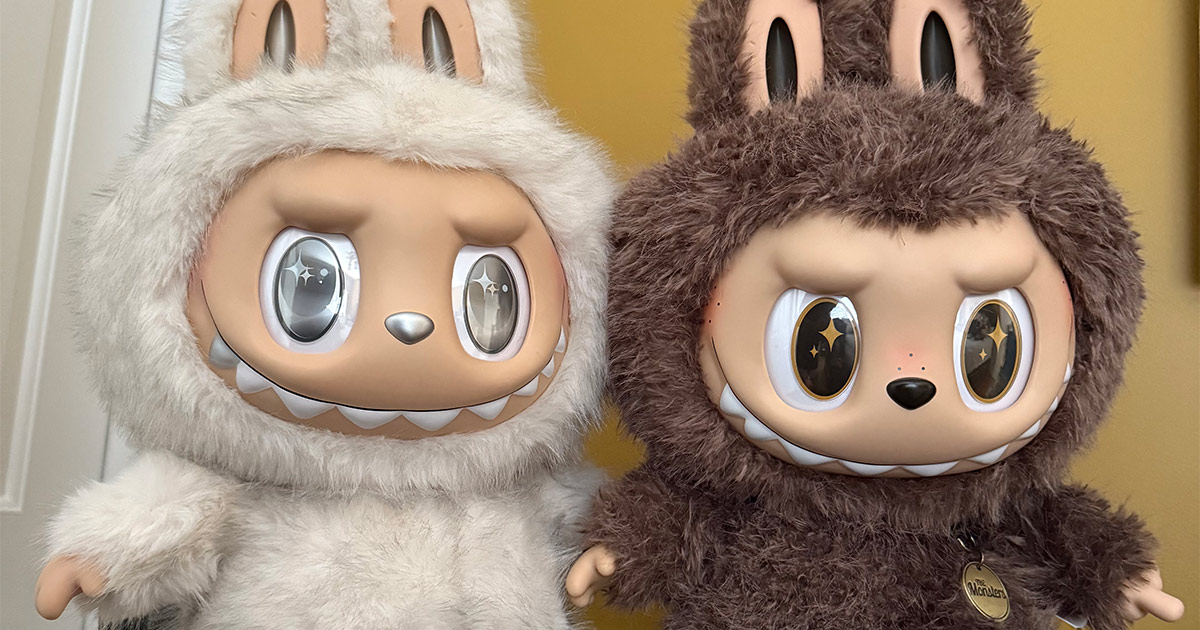 Two large Labubu dolls. 